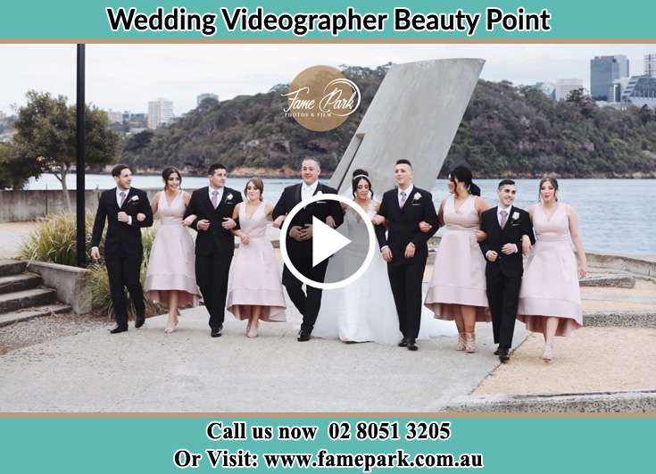 Bride and Groom with their secondary sponsors near the shore Beauty Point NSW 2088