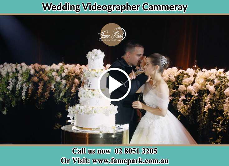 Bride and Groom dinking in front of their wedding cake Cammeray NSW 2062