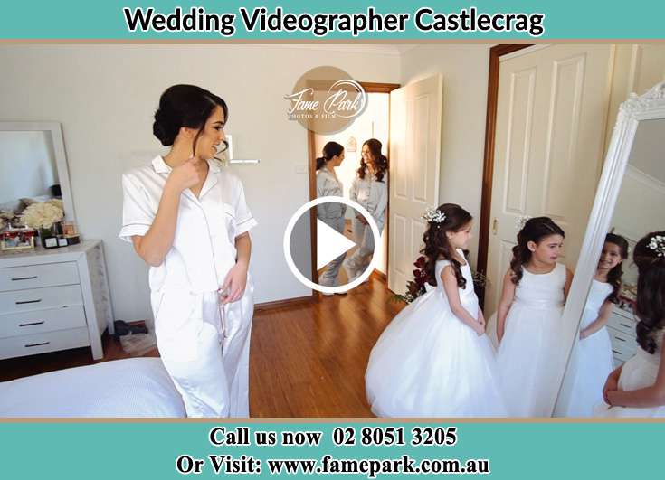 Bride looking at the mirror with her secondary sponsors Castlecrag NSW 2068