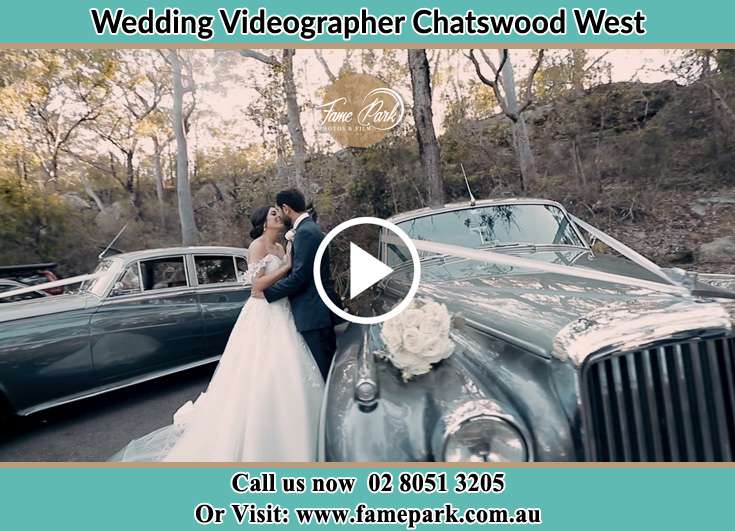 Bride and Groom looking at each other beside their bridal car Chatswood West NSW 2067