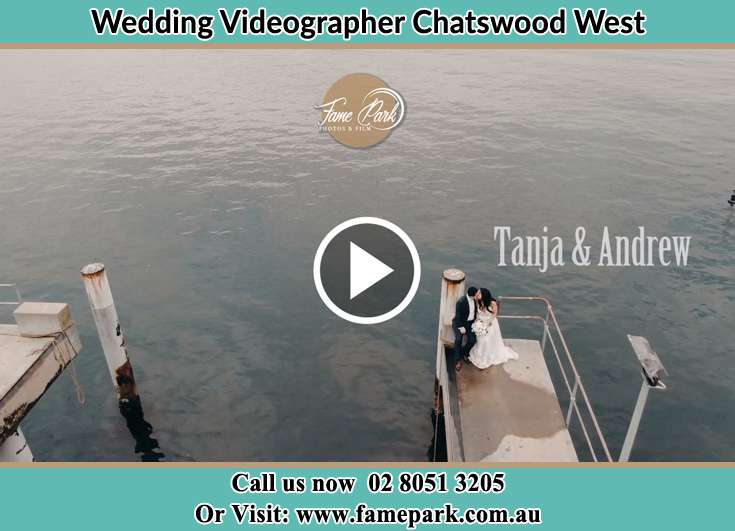 Bride and Groom kissed at the bay while sitting Chatswood West NSW 2067