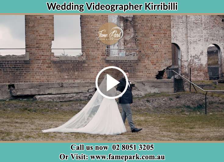 The Groom and the Bride walking through a ruins Kirribilli NSW 2061