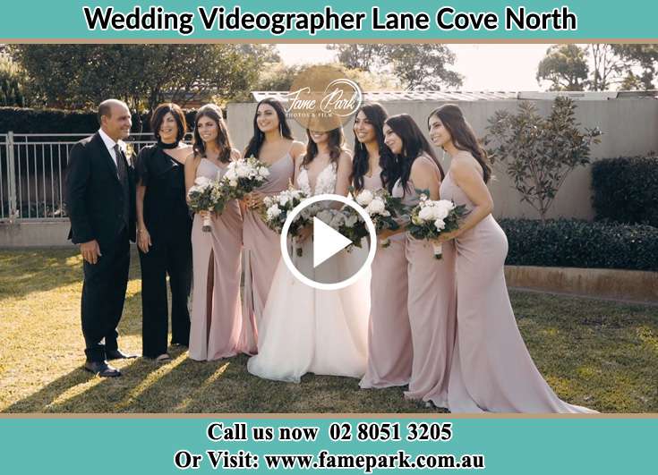 The Bride and her family with the bridesmaids pose for the camera Lane Cove North NSW 2066