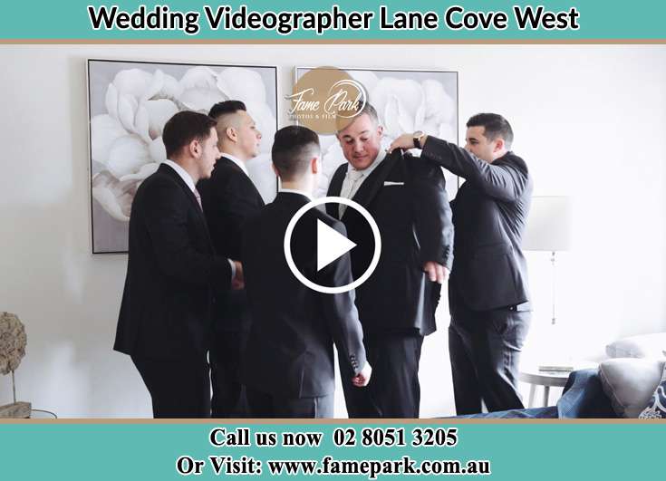 The groomsmen helping the Groom to get ready for the wedding Lane Cove West NSW 2066