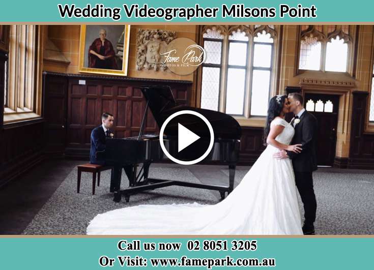 The newlyweds dancing as the pianist play their song Milsons Point NSW 2061